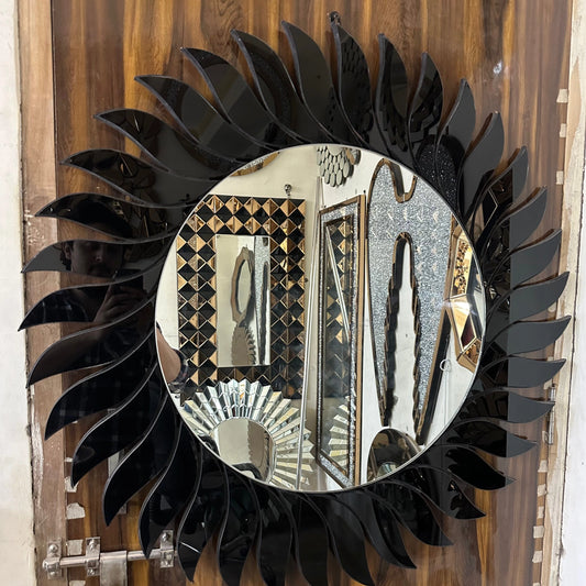 Black Flame Mirror – Bold and artistic round decorative wall mirror with a black flame-inspired glass frame - Fabels