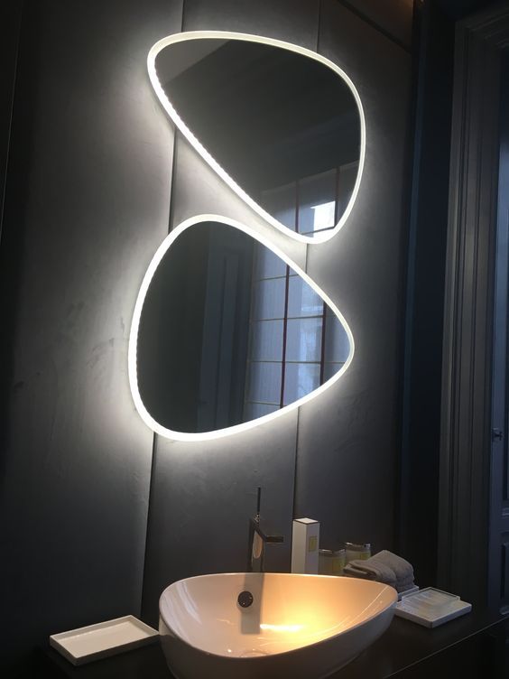 "Irregular Elegance: LED Modern Vanity Mirror with Unique Form and Touch Control"